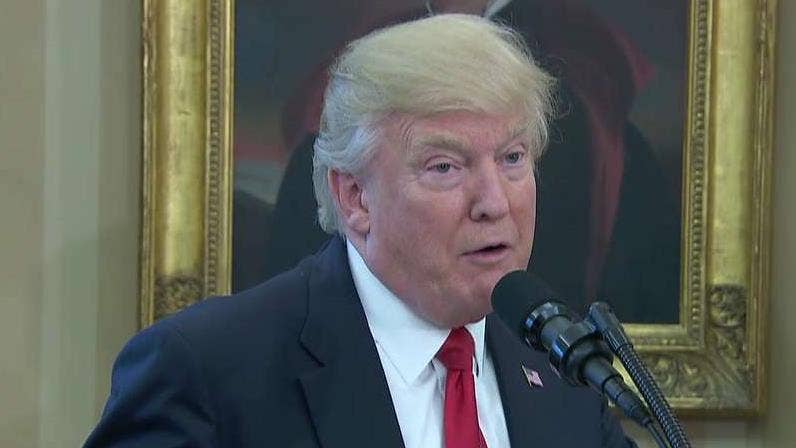 Trump calls White House-Russia controversy 'fake news,' 'total scam'