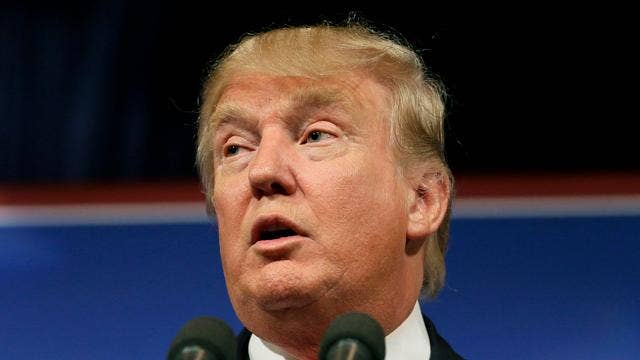 Trump signs order to clamp down on visa program, enforce 'buy American' policy