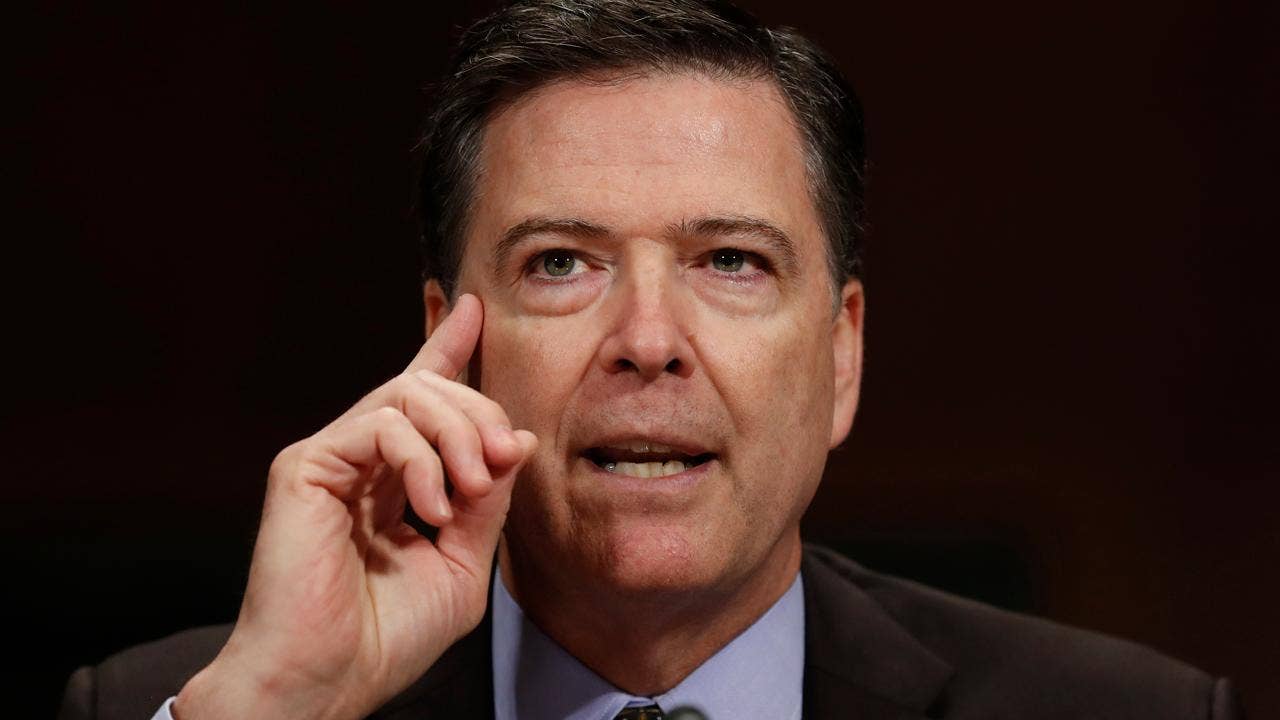 Comey defends handling of email probe after Clinton swipe