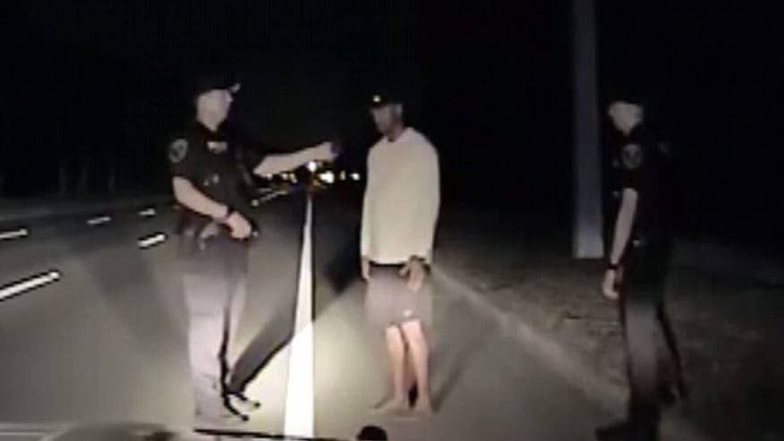 Image result for Florida police release dash cam video from Tiger Woods' DUI arrest