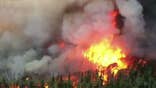 Crews battle wildfires across Western states