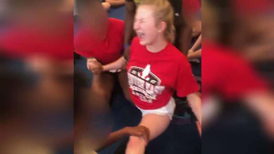 Cheerleader Forced To Do Splits By Coach Says Shes Being Cyberbullied 2102