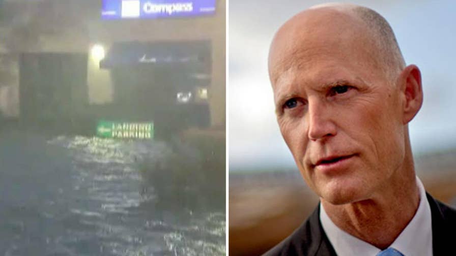 Governor warns residents of downed power lines, storm surge as Irma exits state