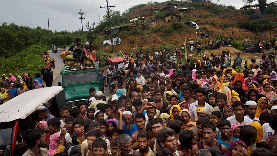 At least 370,000 of Muslim refugees have flooded into Bangladesh over the past two and a half weeks to escape recent violence in Buddhist-majority Burma