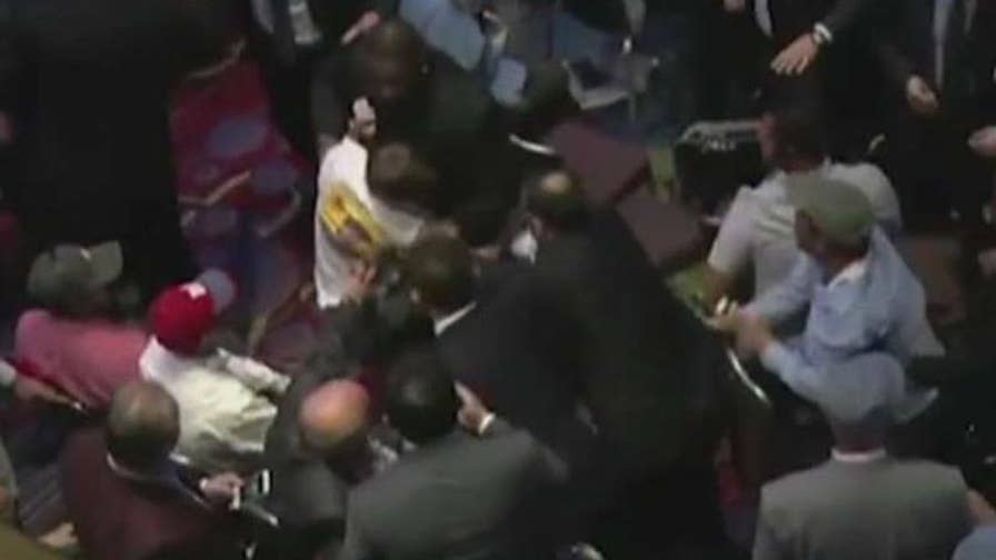 Brawl breaks out in crowd after protesters disrupt event; Laura Ingraham reports