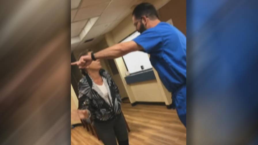 Raw video: Daughter records tense exchange at doctor's office in Gainesville, Florida
