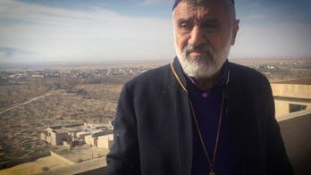 Father Afram of the 133-year-old St. George Cathedral in Iraq shows Fox News how ISIS destroyed his church and Christian imagery throughout the community.