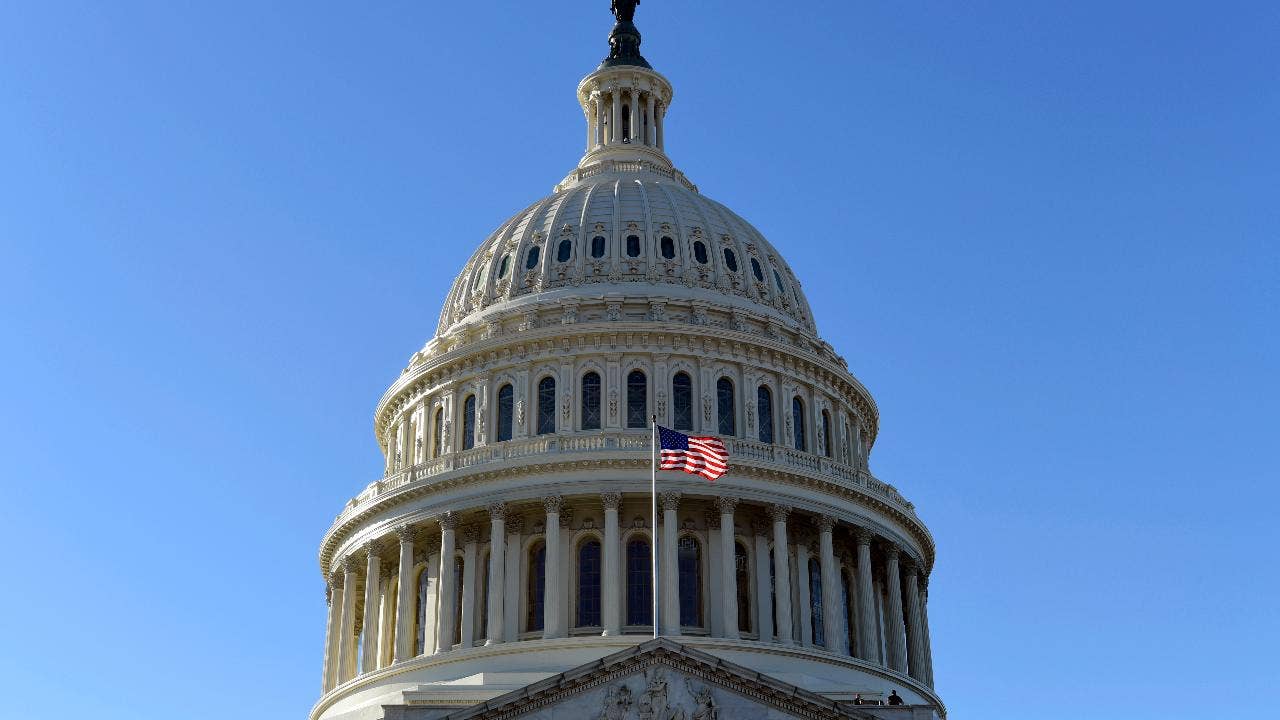 Congress passes bill to avert government shutdown, setting up pre-Christmas showdown