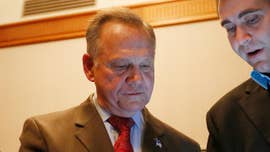 President Trump on Friday called on Roy Moore to throw in the towel in the Alabama Senate race he lost to Democrat Doug Jones on Tuesday following a bruising campaign.