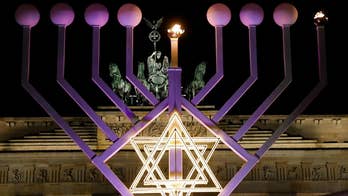 From the world's largest menorah in New York City to a French village that boast some 450 nativity scenes, Christians and Jews welcome Christmas and Hanukkah.