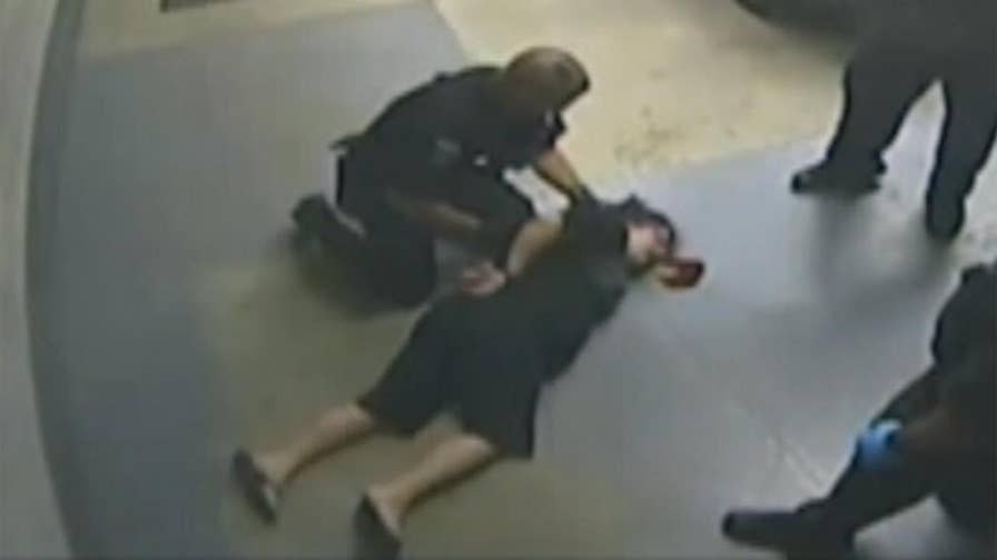 Raw video: Attorney releases footage of incident in Michigan where woman is slammed to ground and knocked unconscious while handcuffed.