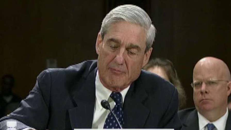 A lawyer for the Trump presidential transition team accuses the special counsel's office of inappropriate obtaining documents.