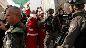 Palestinians try to use the holiday to make a political statement; Conor Powell reports from Jerusalem.