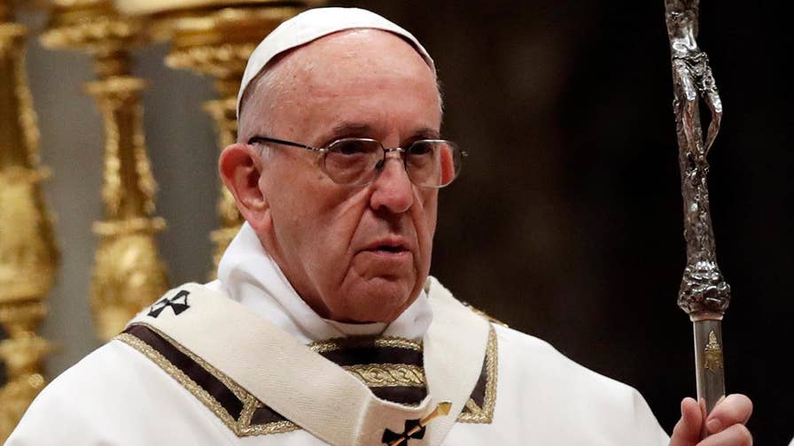 The Catholic faithful flock to St. Peter's Basilica to see the pontiff.