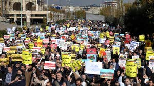 Footage shows waves of demonstrations.

