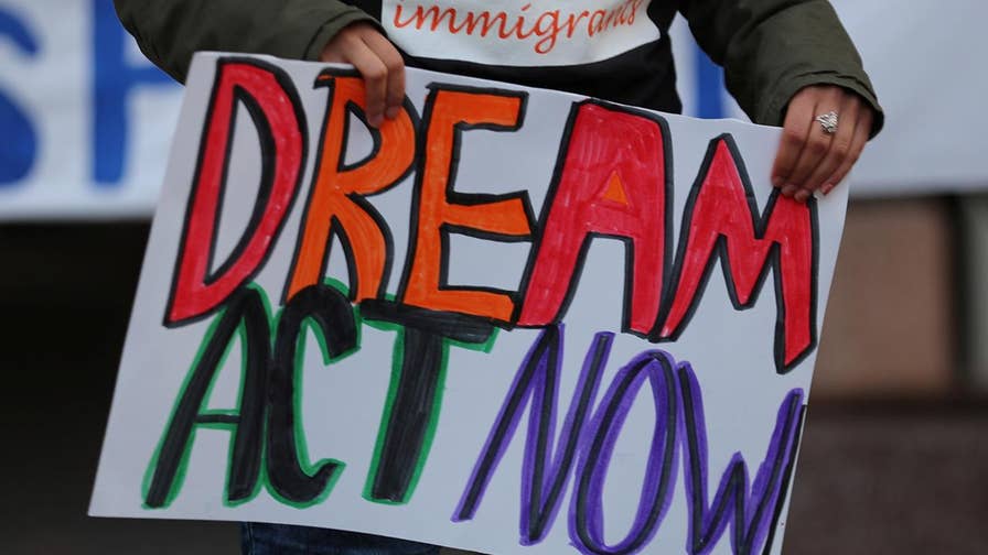 The judge said the program must remain in place while litigation over President Trump's decision to end the program plays out.