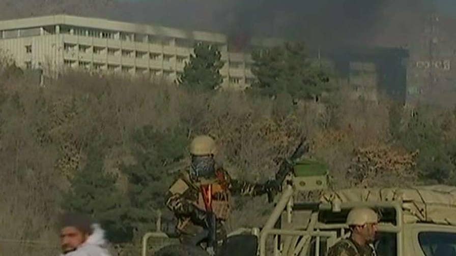 Gunmen stormed the hotel, taking guests hostage.