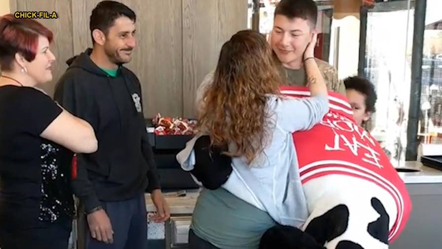 Soldier surprises pregnant wife at ChickfilA, disguises himself in