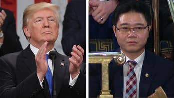Ji Seong-ho holds up his crutches as symbol of defiance to the North Korea regime after President Trump details his harrowing journey to freedom.