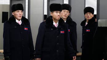 Raw video: North Korean winter Olympic team members, officials arrive in Gangneung.