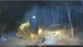 Dramatic patrol car video shows a Georgia police officer shooting and killing a man who came towards him with a knife after a high-speed chase ended in a crash.