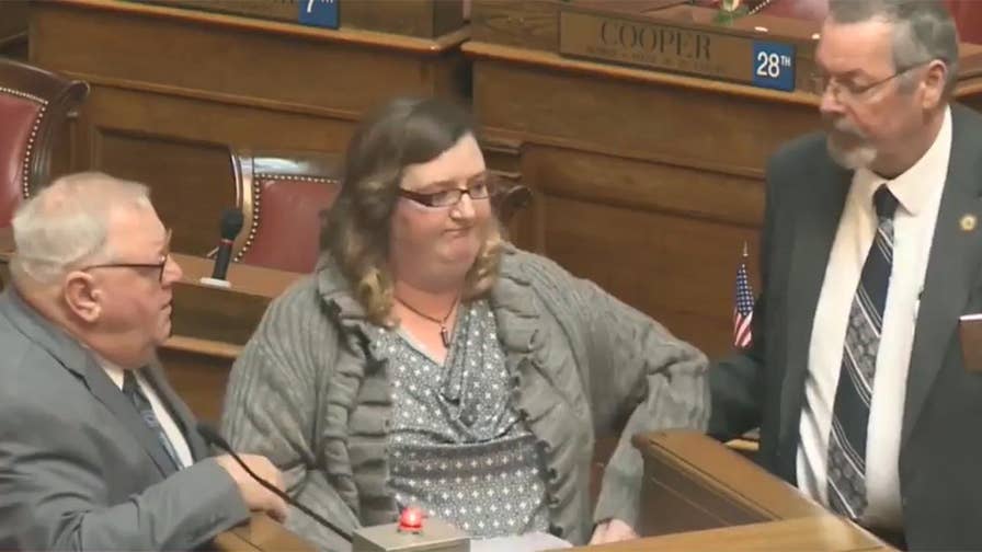 West Virginia woman dragged out of capitol for reading list of