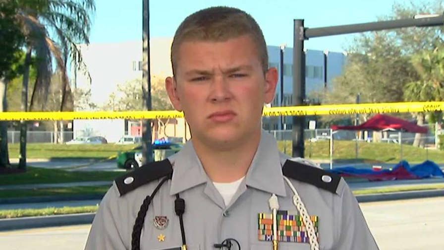 Marjory Stoneman Douglas student explains on 'Fox & Friends' how he shielded his classmates from gunfire during school shooting in Parkland, Florida.