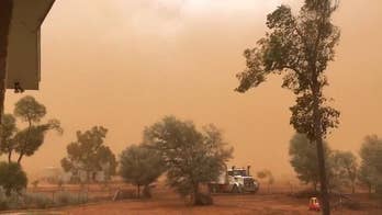 A huge dust storm, complete with 60 mph winds hits Charleville in Queensland, Australia and deposits a film of orange dust over the town.