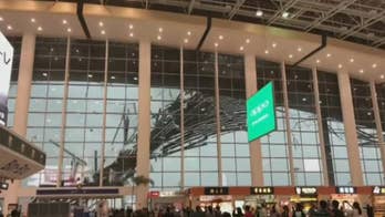 Incredible video shows gale-force winds destroying the roof of an airport in east China