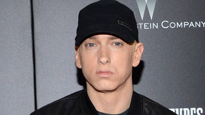 Image result for Eminem slams NRA: 'They love their guns more than our children'