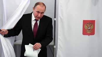 Vladimir Putin expected to beat seven other candidates.
