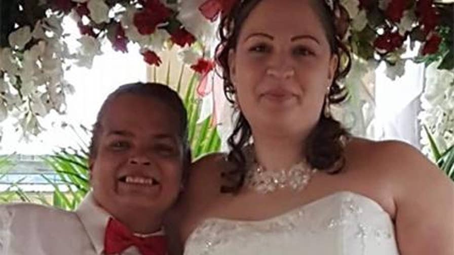 Women marry in Walmart's garden section in front of friends, family and