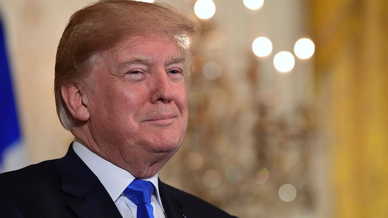 Trump signs $1.3 trillion spending bill, despite earlier threat to veto