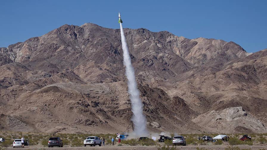 'Mad' Mike Hughes suffers back injuries in hard landing after launching himself into the air with homemade rocket in effort to prove Earth is flat.