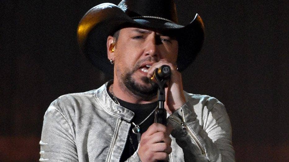 Jason Aldean wins ACM Awards' Entertainer of the Year at show focusing on healing through music after Las Vegas shooting