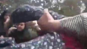 Raw video: Iran morality police assault woman over loose fitting hijab that only partially covered her hair.