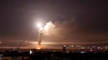 Israel fires missiles at Iranian targets in Syria following Iran's first direct rocket attack on Israeli soldiers. The conflict comes two days following Trump's exit from nuclear deal.