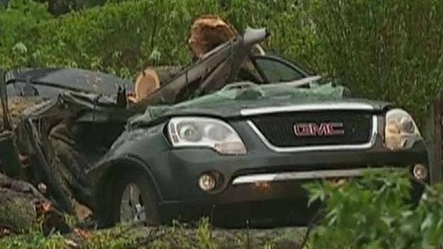 At least 2 dead, hundreds of thousands without power after violent storms slam Northeast