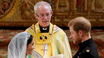 Royal couple exchange vows, rings at royal wedding in St. George's Chapel, Windsor.