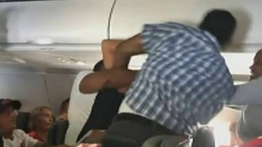 American Airlines Passenger Sparks Mid Flight Brawl After Denied Beer Threatening To Kill