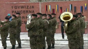 Defense Minister Mariusz Blaszczak says his country needs U.S. boots on the ground as protection from Russia after its annexation of Crimea.