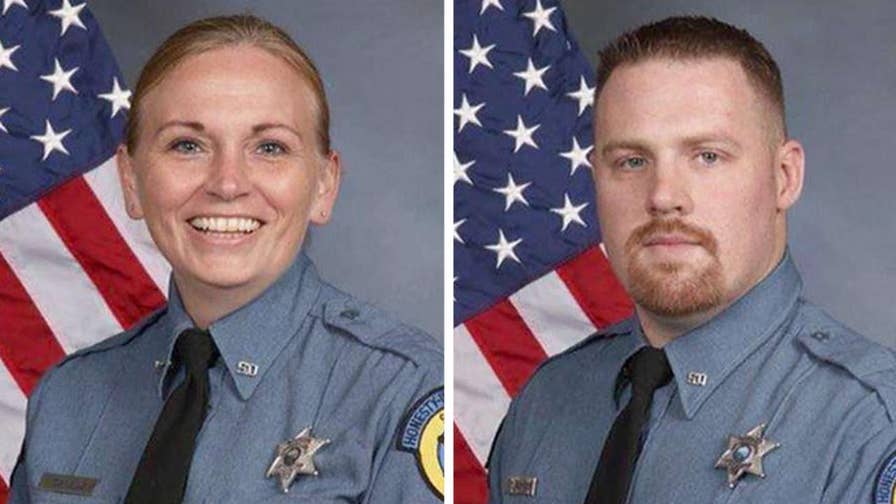 Two Kansas sheriff #39 s deputies killed in shooting were both parents