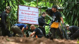 A rescue effort to free 12 youth soccer players and their 25-year-old coach, who have been trapped in a cave in northern Thailand for two weeks, was underway Sunday, according to reports.