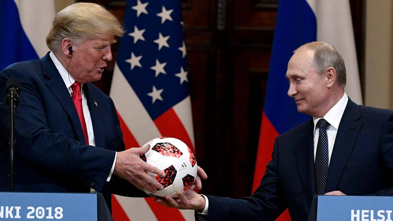 Image result for Putin gives Trump a World Cup soccer ball