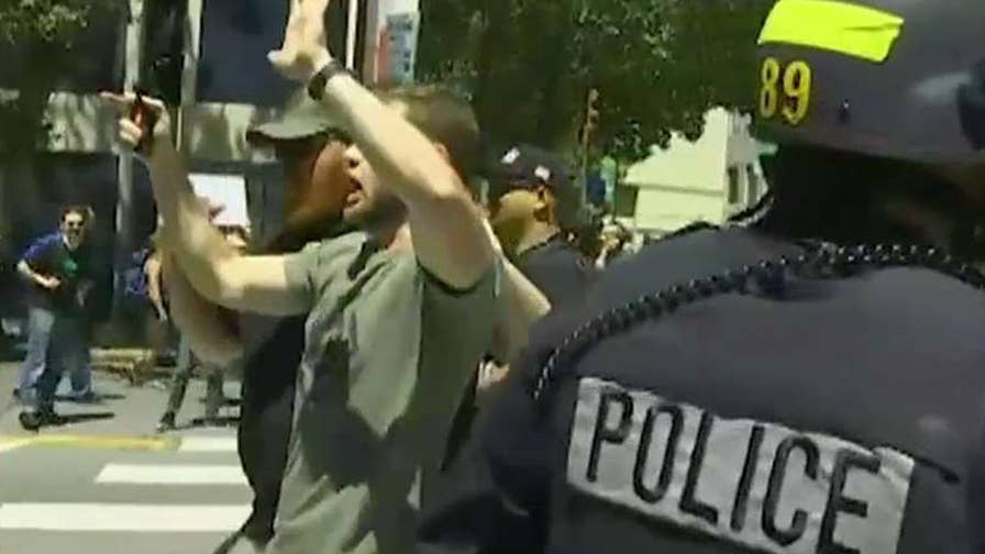 Violent clashes erupt between far-right and far-left protesters in California.