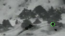 The U.S. Air Force on Thursday released an aerial video that shows highlights of Tech Sgt. John Chapman&rsquo;s heroics during hand-to-hand combat on an Afghanistan peak before he was killed by Al Qaeda militants.
