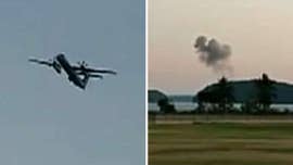 A Horizon Air passenger plane crashed on an island in Puget Sound Friday night, not long after a suspect conducted an "unauthorized take-off" from Seattle-Tacoma International Airport in Washington state, officials said.