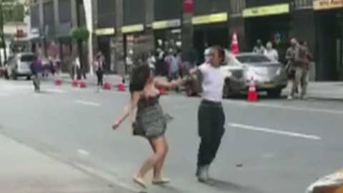 New York City taxi driver arrested following road rage fight captured on video