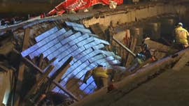 Hundreds of people were injured after an oceanside boardwalk in Spain collapsed during a nighttime concert, police said Monday.