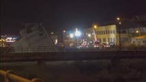 Raw video: Emergency workers in Genoa, Italy, clear debris and wrecked vehicles from the scene of the collapse. 
